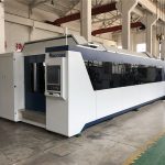 มืออาชีพ cnc เครื่องตัดไฟเบอร์เลเซอร์ 1000 วัตต์ 1500 วัตต์พร้อมแลกเปลี่ยนตาราง